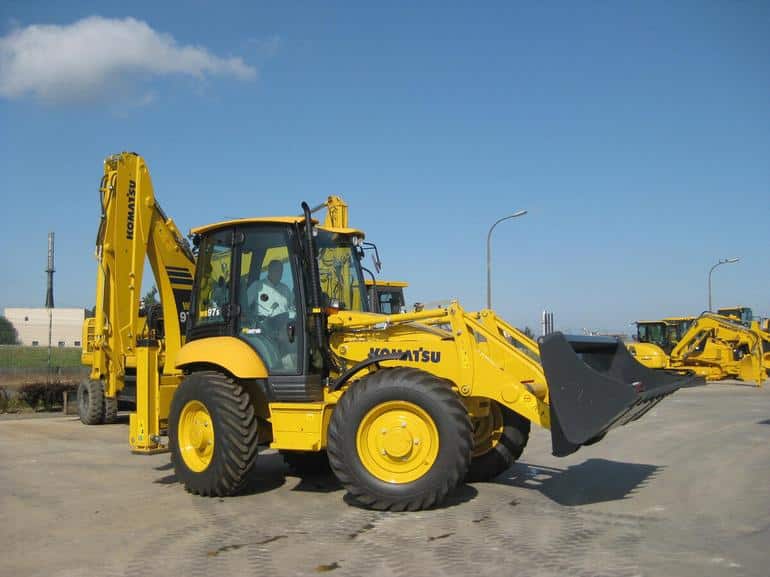 Komatsu WB97S universal earthmoving loader. Photo №2