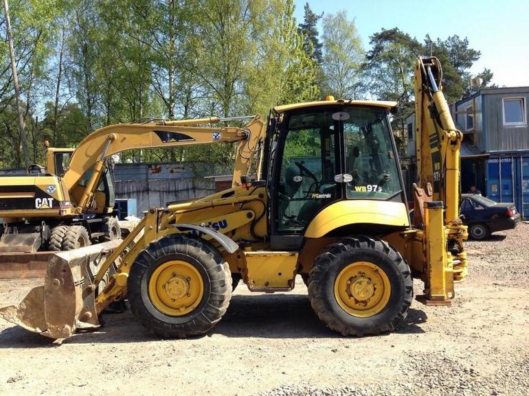 Komatsu WB97S universal earthmoving loader. Photo №3